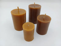 Closer view of classic smooth beeswax pillar candles