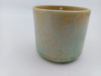 Seafoam ceramic beeswax candle front view