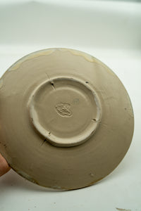 Hand-finished base and maker's mark on the Amber Nucleus bowl