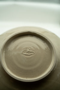 Hand-finished base and maker's mark on the Frosted Earth bowl