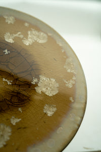 Close detail of amber glaze, crackle and ivory crystals