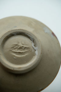 Hand-finished base and maker's mark on the crystalline bowl